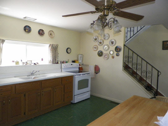 9065 Cunningham Road Winnebago, IL 61088 - Photo 4 of 6 a kitchen with cabinets a sink and dishwasher
