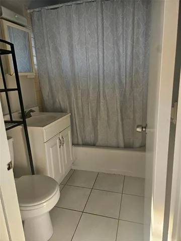 a bathroom with a sink and toilet