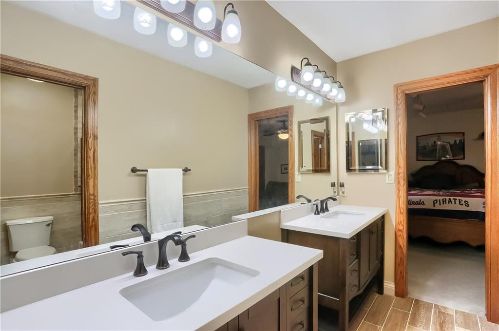 325 Overbrook Road Valencia, PA 16059 - Photo 32 of 34 a bathroom with a sink and a mirror