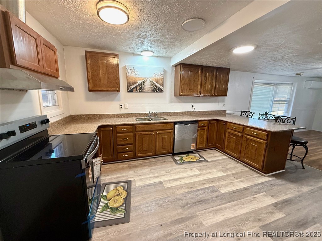 741 Newport Road Fayetteville, NC 28314 - Photo 18 of 48 a kitchen with a sink appliances and cabinets