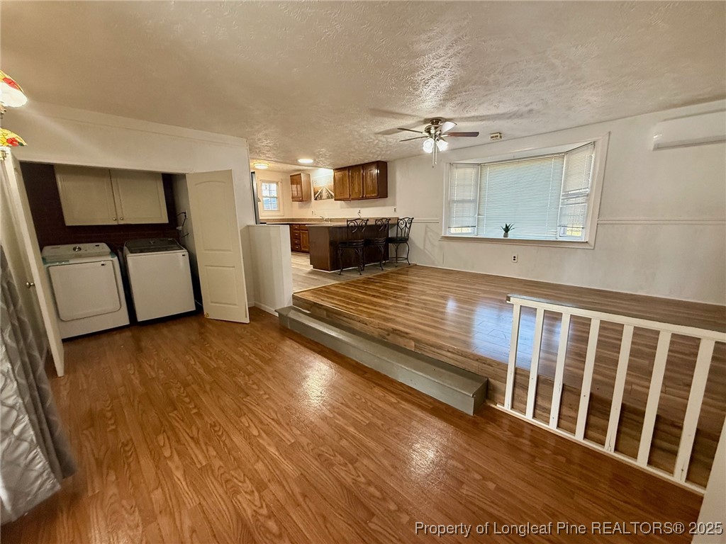 741 Newport Road Fayetteville, NC 28314 - Photo 24 of 48 a living room with furniture and a flat screen tv