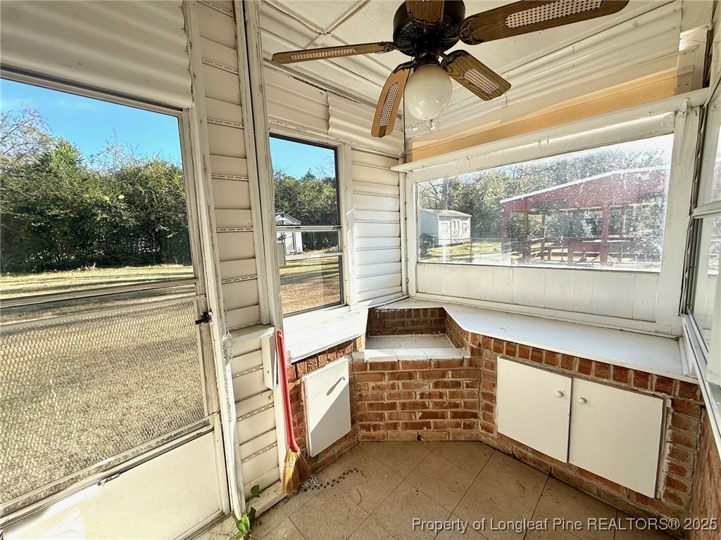 741 Newport Road Fayetteville, NC 28314 - Photo 30 of 48 a kitchen with stainless steel appliances granite countertop a stove and a refrigerator