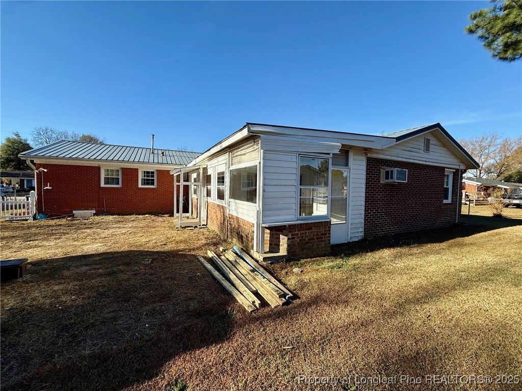 741 Newport Road Fayetteville, NC 28314 - Photo 36 of 48 a front view of a house with a yard