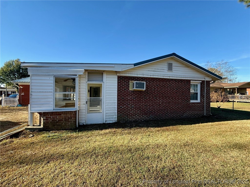 741 Newport Road Fayetteville, NC 28314 - Photo 37 of 48 a front view of a house with a yard