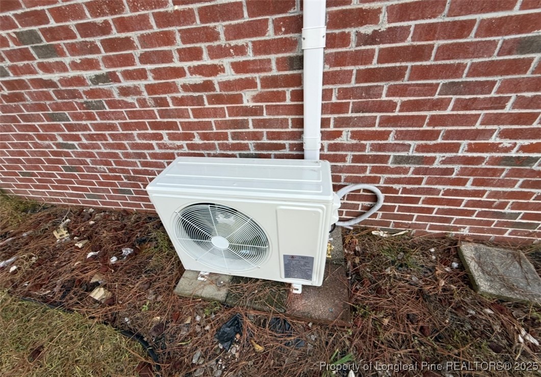 741 Newport Road Fayetteville, NC 28314 - Photo 46 of 48 a bathroom with a sink and a mirror