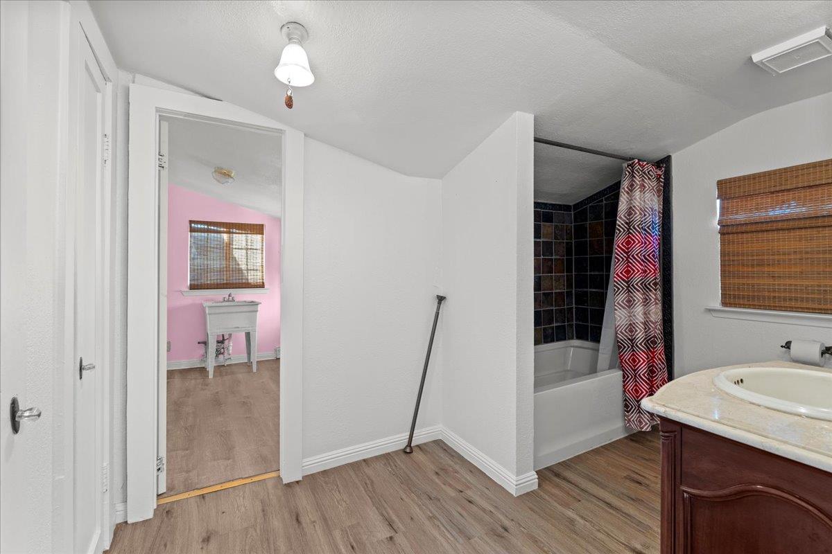 23707 North Graham Road Acampo, CA 95220 - Photo 17 of 37 a bathroom with a sink and mirror