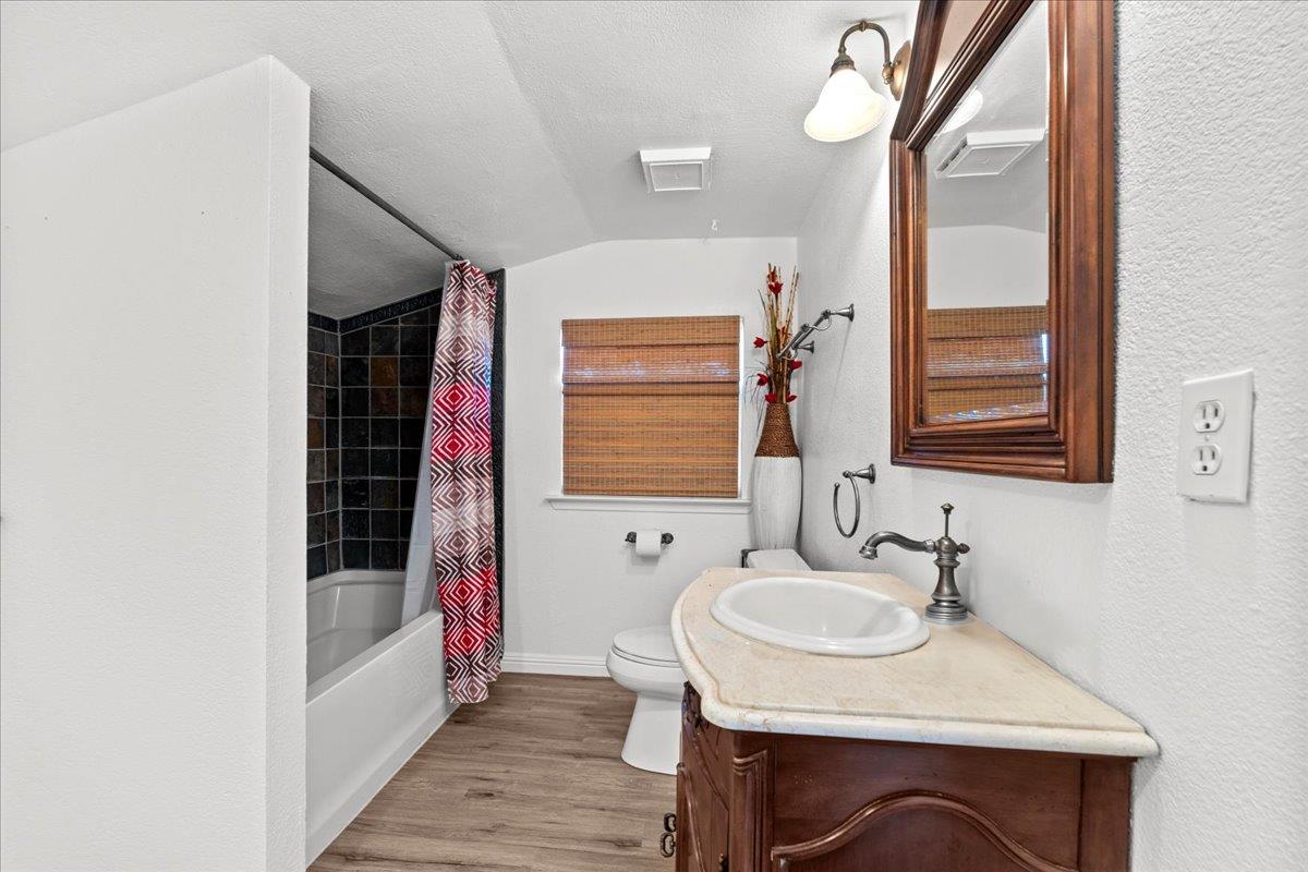 23707 North Graham Road Acampo, CA 95220 - Photo 18 of 37 a bathroom with a sink and a mirror