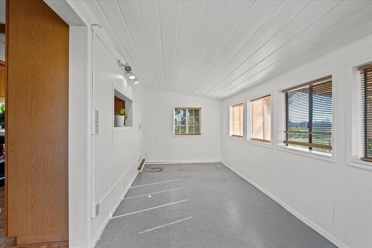 23707 North Graham Road Acampo, CA 95220 - Photo 20 of 37 a view of an empty room with a window