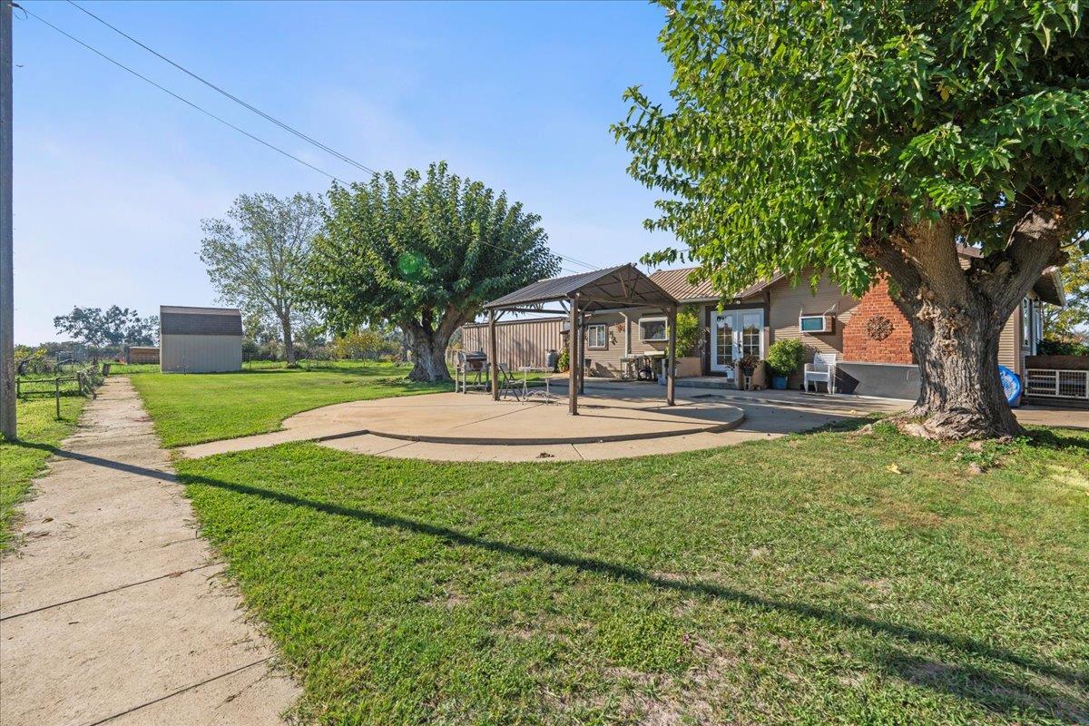 23707 North Graham Road Acampo, CA 95220 - Photo 26 of 37 a house with garden in front of it