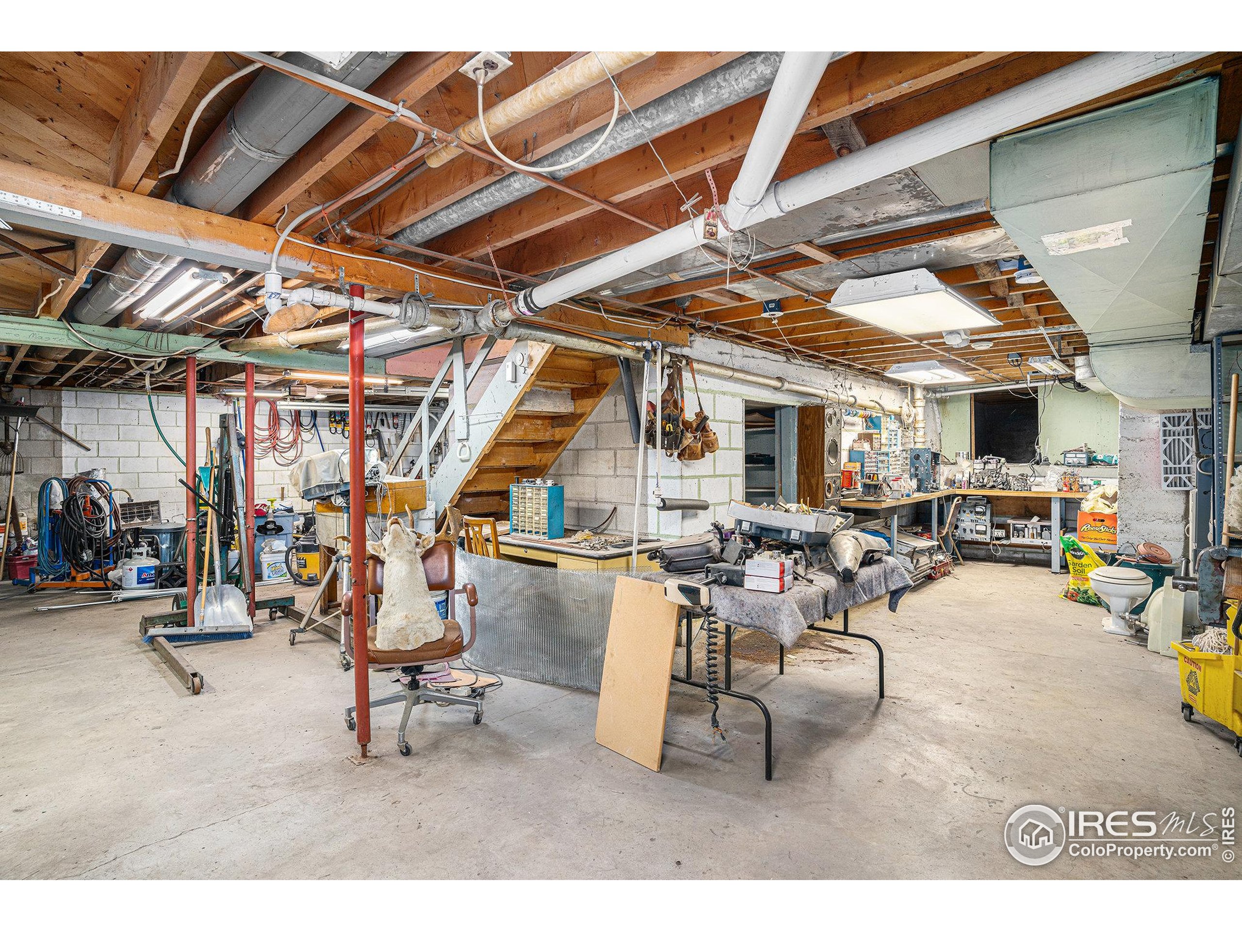 143 Waltonia Road Drake, CO 80515 - Photo 22 of 30 a view of a room with gym equipment