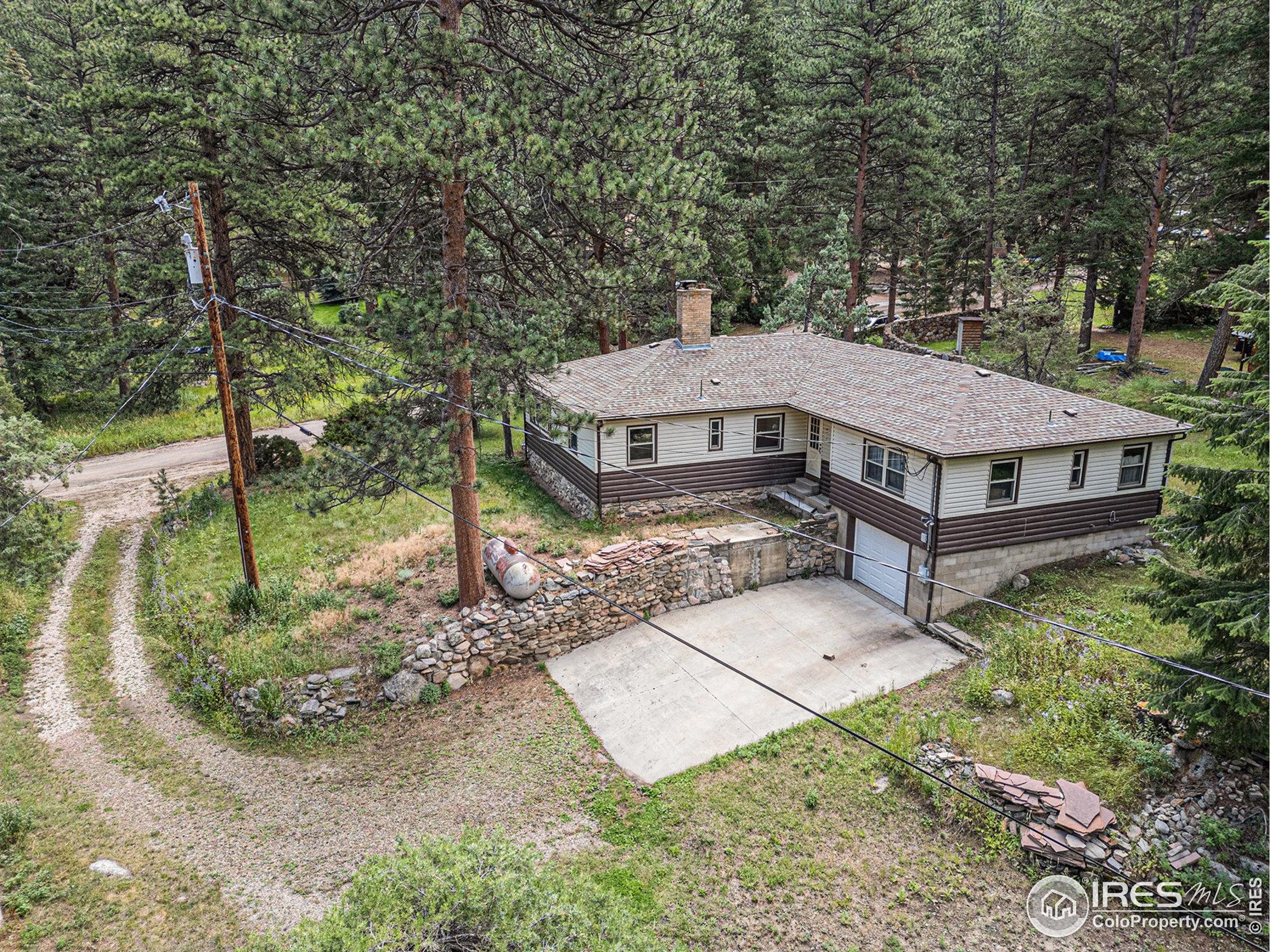 143 Waltonia Road Drake, CO 80515 - Photo 27 of 30 an aerial view of a house with a yard