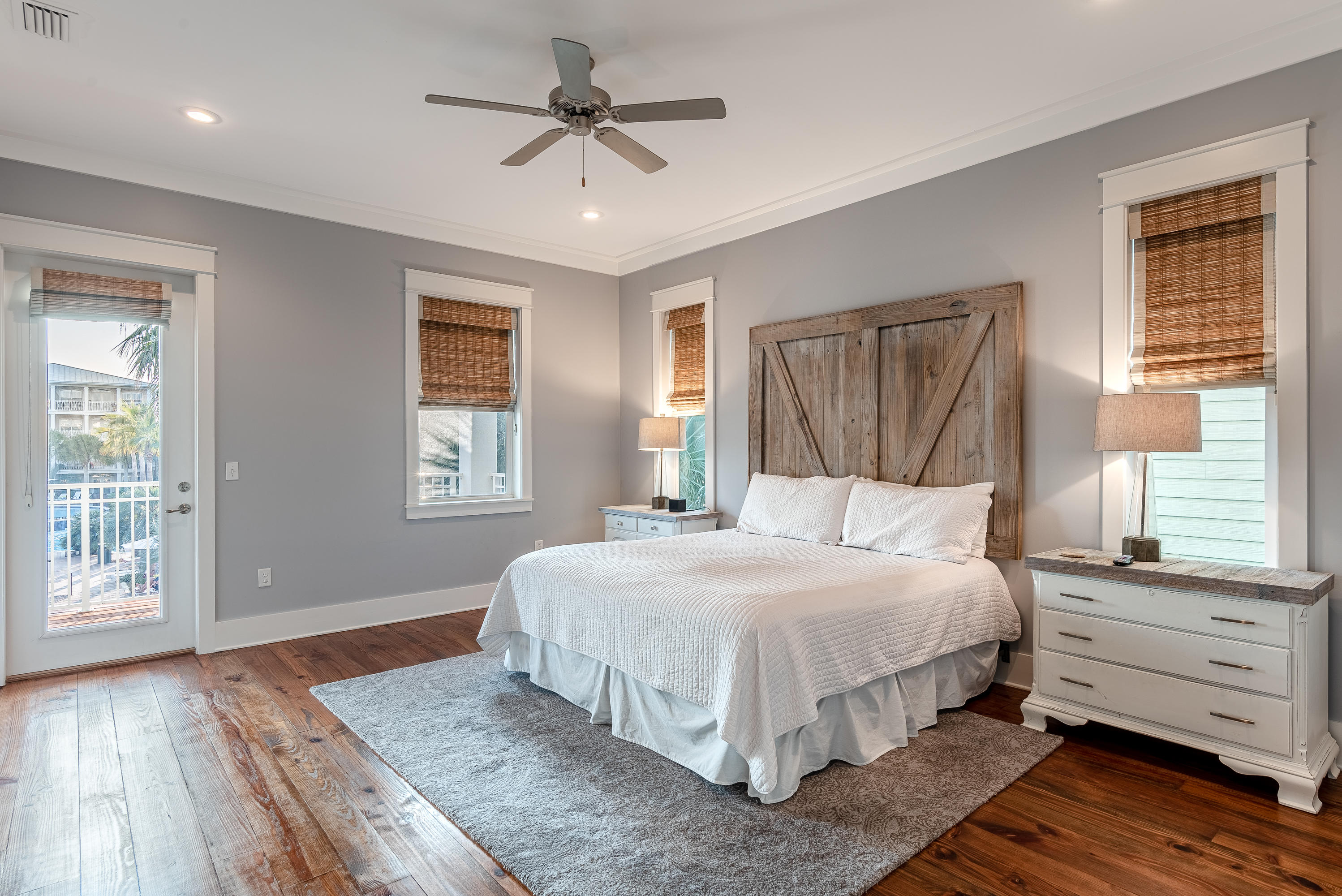 35 West Cobia Run Inlet Beach Inlet Beach, FL 32461 - Photo 8 of 55 a bedroom with a large bed a chandelier and windows