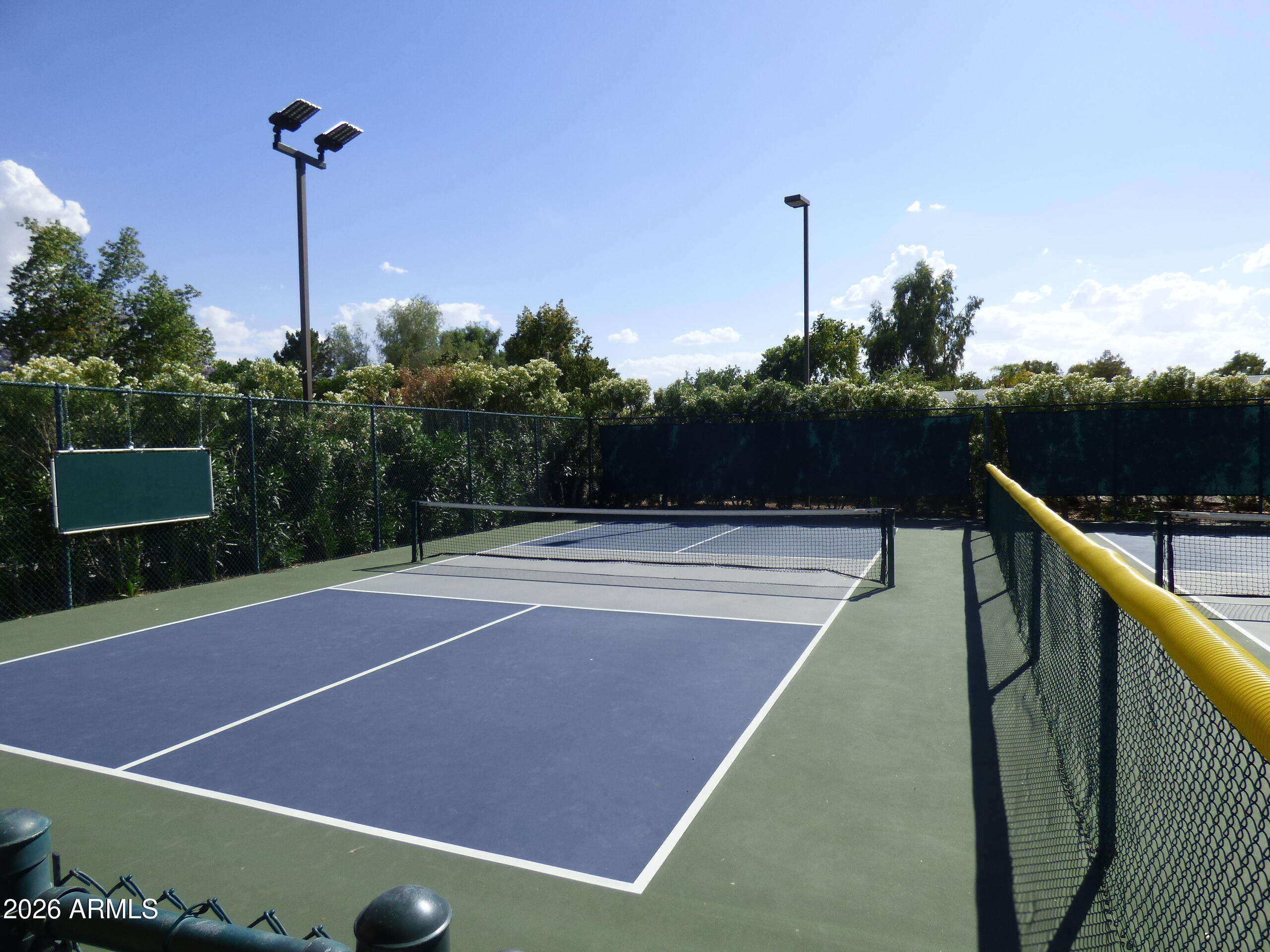 14300 West Bell Road, Unit 349 Surprise, AZ 85374 - Photo 24 of 32 a view of a tennis court
