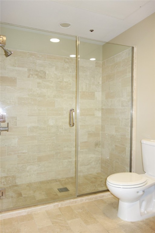 1600 Barton Springs Road, Unit 1407 Austin, TX 78704 - Photo 26 of 38 a bathroom with a toilet and a shower