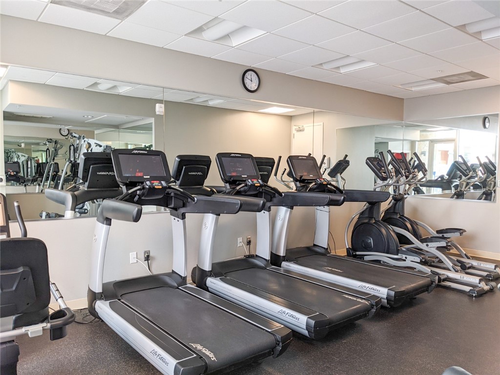 1600 Barton Springs Road, Unit 1407 Austin, TX 78704 - Photo 31 of 38 a room with gym equipment and windows