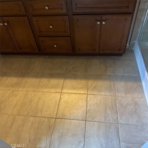 a view of a chandelier with a bathroom