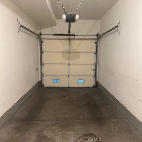 an empty room with wooden floor