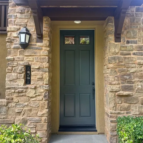 a front view of a house with a door
