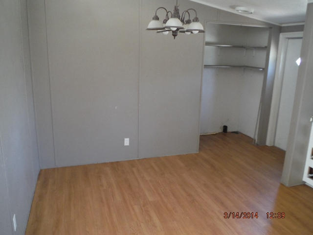 2310 James Peaden Road Baker, FL 32531 - Photo 5 of 7 a view of room with racks on the wall