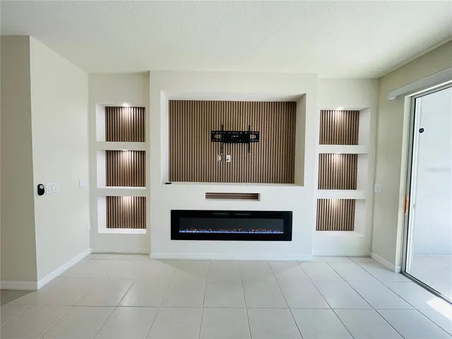 a spacious bathroom with a double vanity and a bathtub
