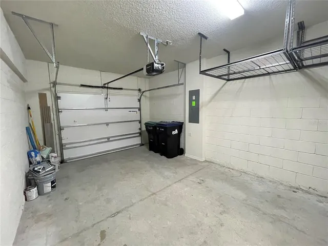 a view of a park with slide and table