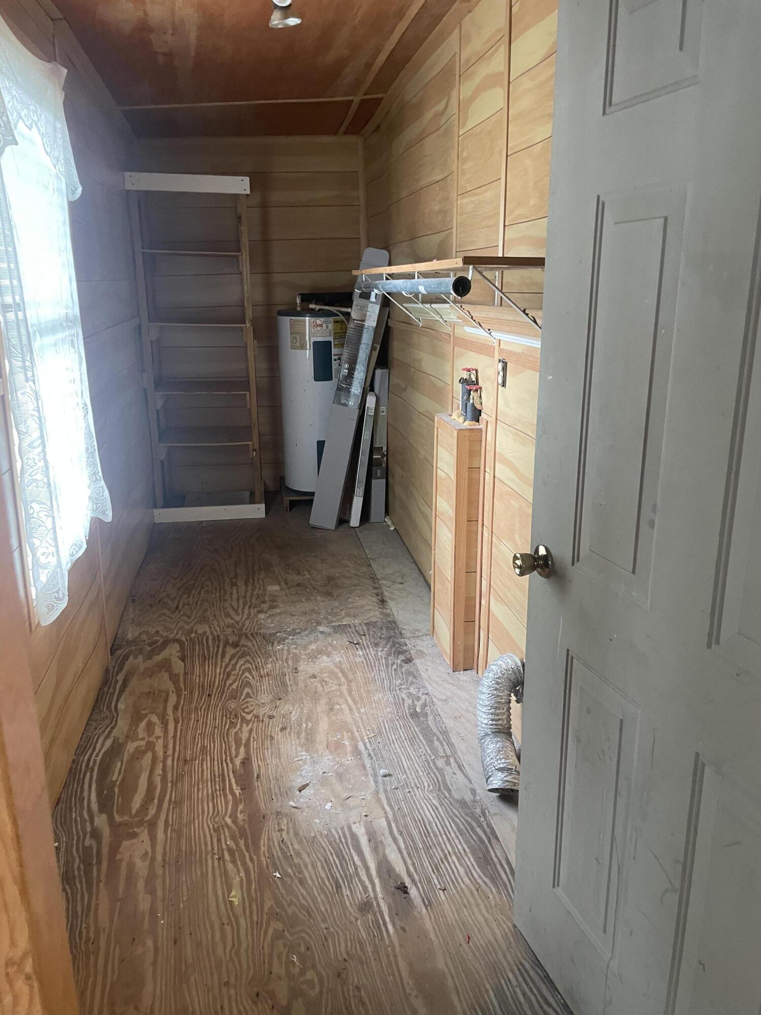 5127 Redbug Lane Vernon, FL 32462 - Photo 11 of 18 a view of a storage & utility room