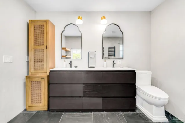 a bathroom with a sink and a toilet