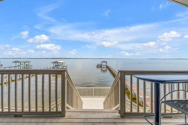 a view of a chairs and tables in the patio