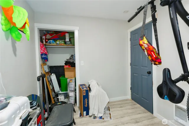 a view of a closet with storage