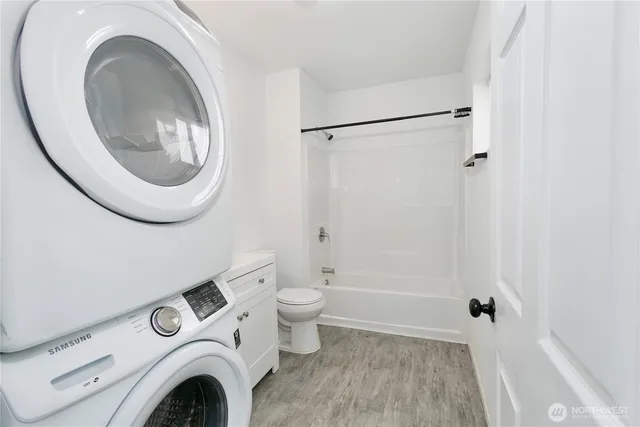 a bathroom with a toilet and a sink