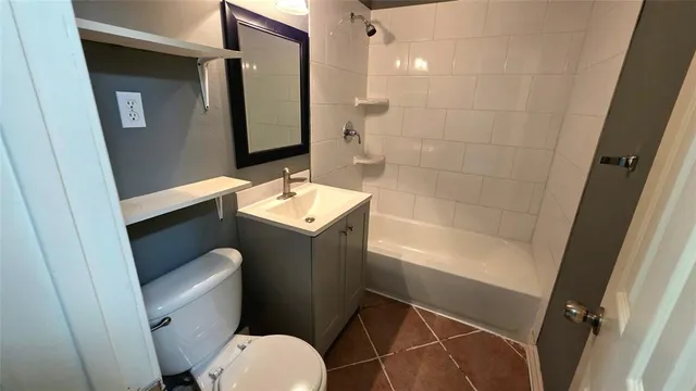 a bathroom with a sink a mirror and a bathtub