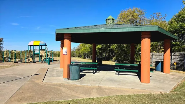 a view of a park with swings