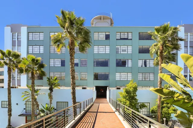 a front view of a multi story residential apartment building