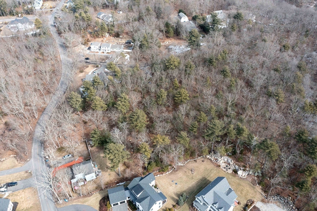 106 Indian Lane Canton, MA 02021 - Photo 10 of 28 an aerial view of a house with yard and outdoor seating