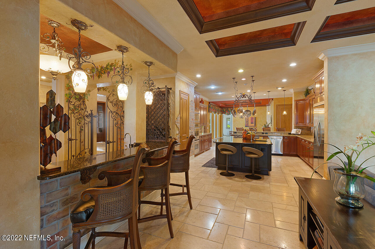 13639 Queens Harbor Boulevard Jacksonville, FL 32225 - Photo 21 of 59 Bar overlooking family room and kitchen