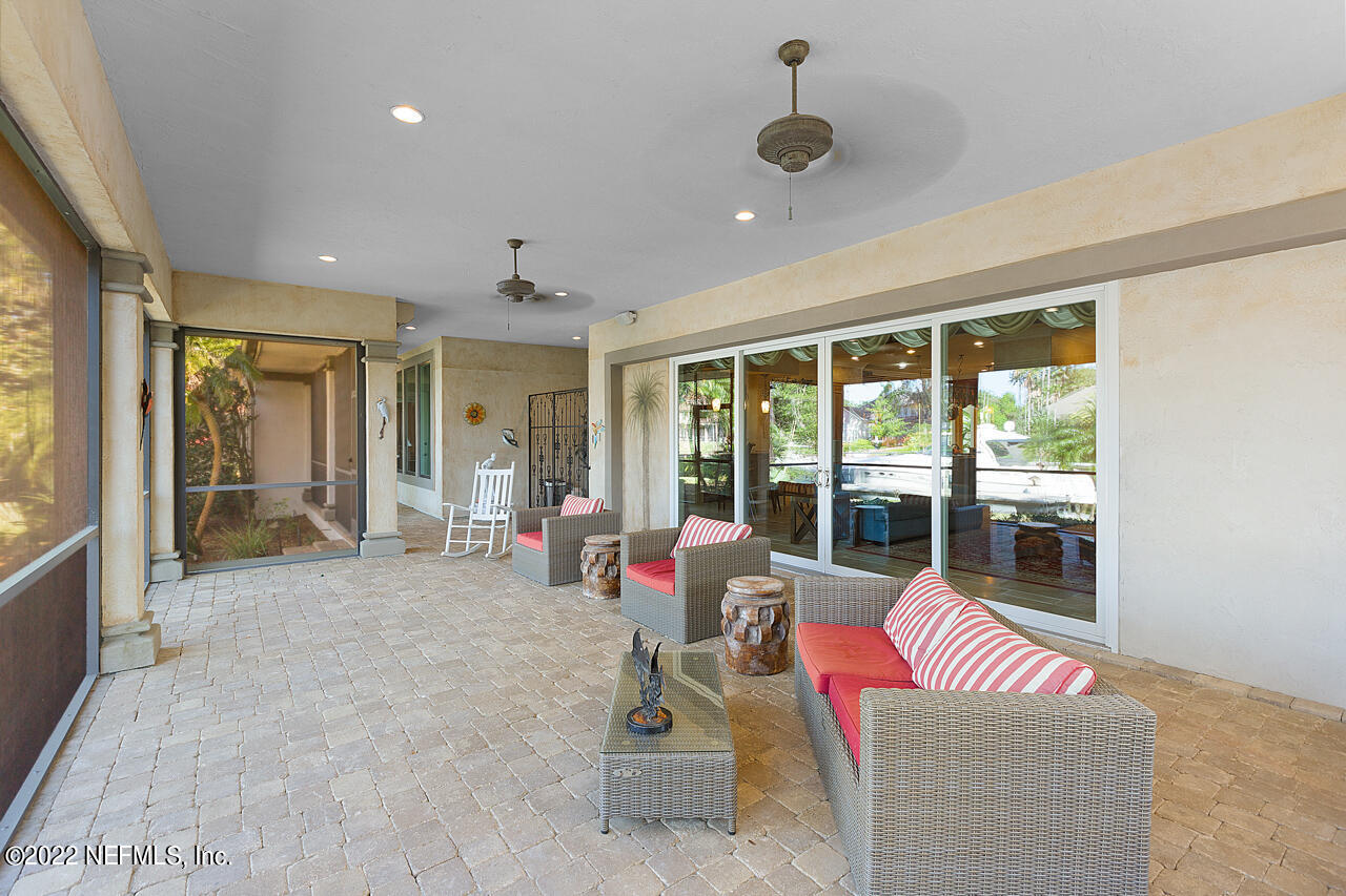 13639 Queens Harbor Boulevard Jacksonville, FL 32225 - Photo 42 of 59 Lanai looking at at dock/lagoon area