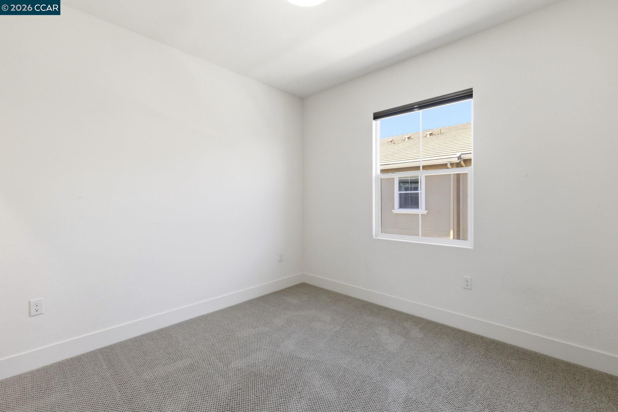 205 Plum Tree Street Livermore, CA 94551 - Photo 37 of 47 an empty room with a window