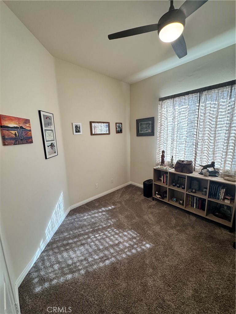 11000 Rockaway Glen Road Apple Valley, CA 92308 - Photo 9 of 17 a room with furniture and window