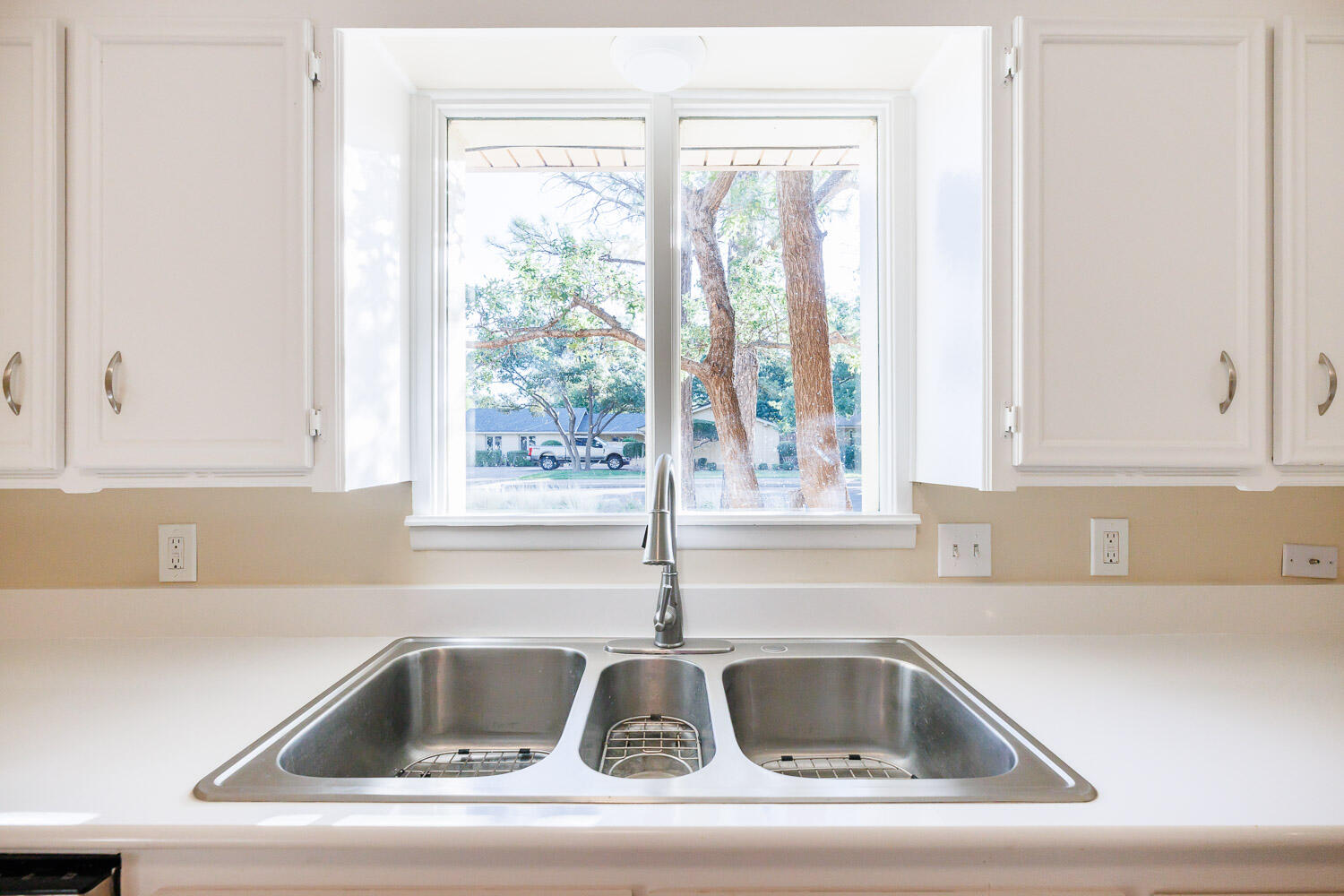 3603 77th Drive Lubbock, TX 79423 - Photo 15 of 72 a close view of sink and tap