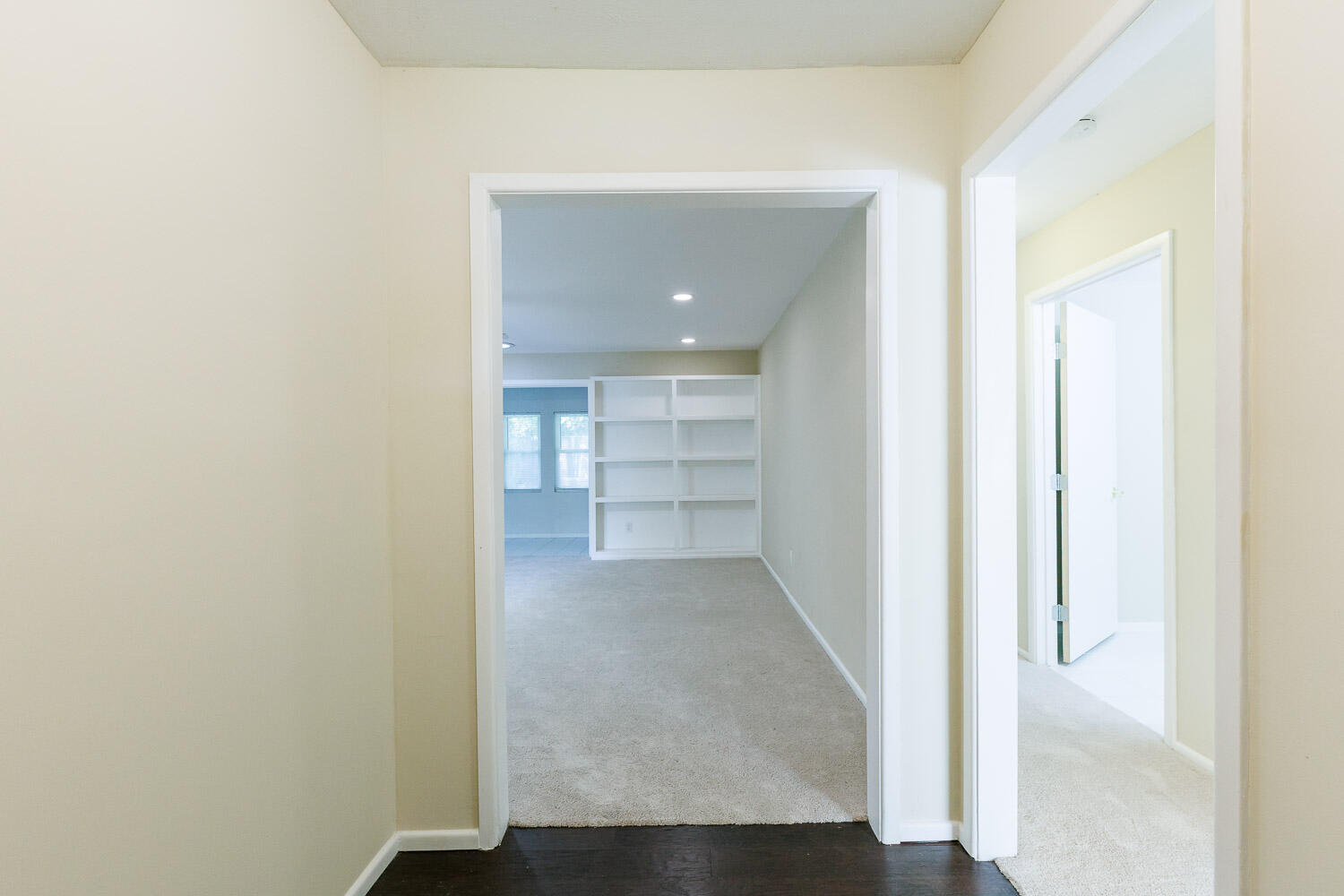 3603 77th Drive Lubbock, TX 79423 - Photo 2 of 72 a view of a hallway with wooden shelves