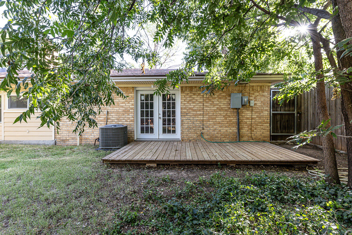 3603 77th Drive Lubbock, TX 79423 - Photo 59 of 72 a view of a house with a yard