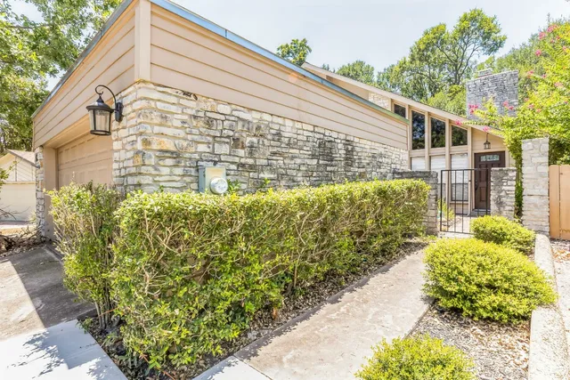 a view of a back yard of the house