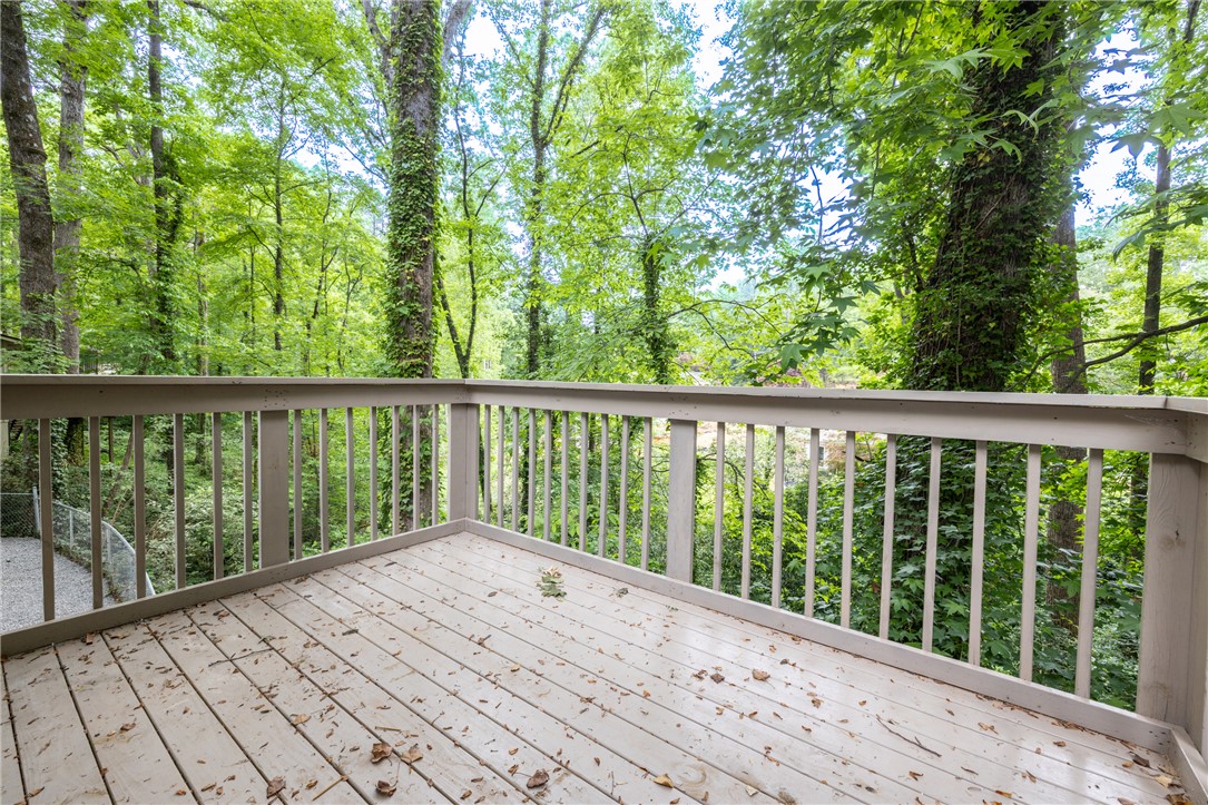 309 Woodland Way Clemson, SC 29631 - Photo 31 of 43 Enjoy tranquil woodland views from this inviting outdoor deck, perfect for relaxation and fresh air.
