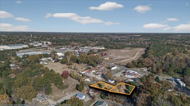 an aerial view of residential house with outdoor space