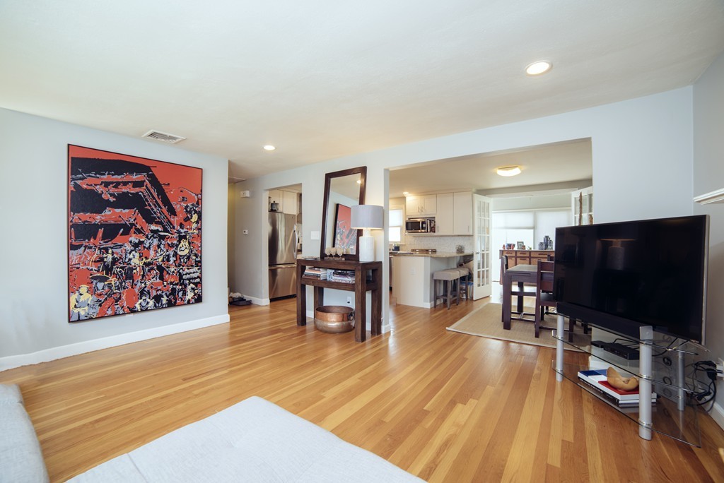 2 Janet Road Arlington, MA 02474 - Photo 3 of 25 a living room with furniture and a flat screen tv