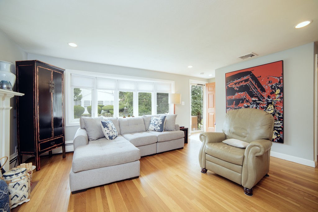 2 Janet Road Arlington, MA 02474 - Photo 4 of 25 a living room with furniture and a flat screen tv
