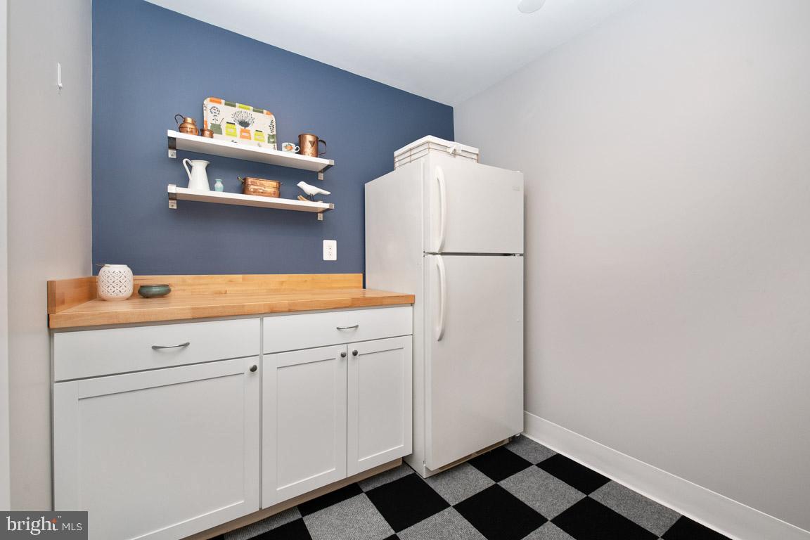 125 South Hilltop Road Baltimore, MD 21228 - Photo 48 of 66 Convenient second fridge and storage