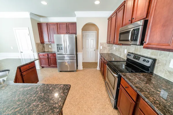 a living room with a couch and a table