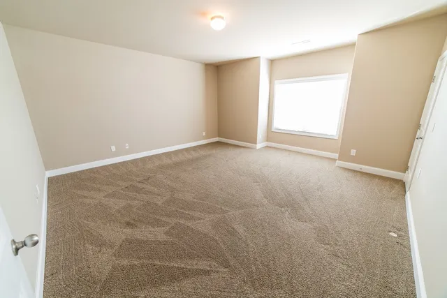 an empty room with an entryway