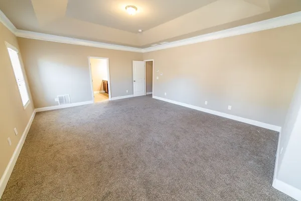 a spacious bathroom with a double vanity sink mirror and double